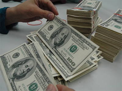 Tăng tỉ giá: Đừng quá lạc quan!