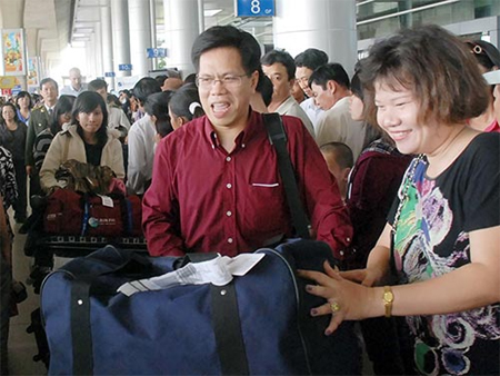 Bỏ quy định về việc đăng ký giữ quốc tịch Việt Nam