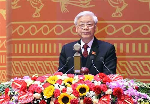 Tổng Bí thư Nguyễn Phú Trọng trình bày Báo cáo của Ban Chấp hành Trung ương Đảng khóa XI về các văn kiện Đại hội XII của Đảng
