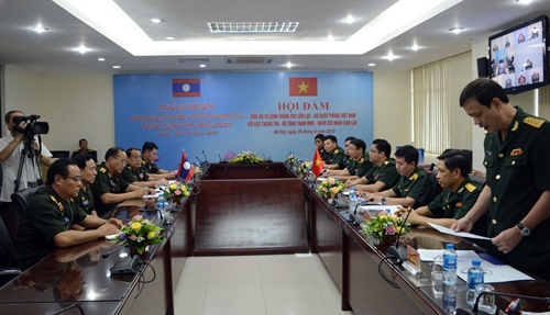 Ký Bản ghi nhớ kỹ thuật về thiết lập đường thông tin nóng giữa Bộ Quốc phòng hai nước Việt Nam - Lào