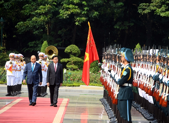 Lãnh đạo Đảng, Nhà nước đón tiếp và hội đàm với Thủ tướng Lào Thongloun Sisoulith

