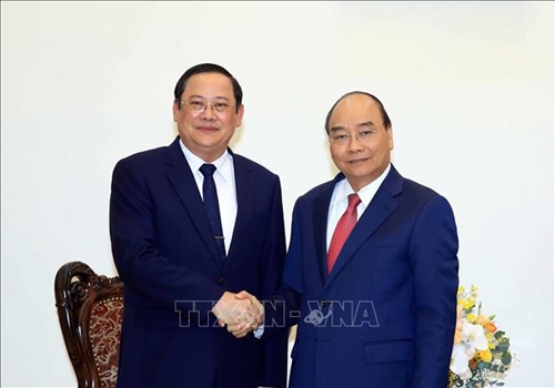 Thủ tướng Nguyễn Xuân Phúc tiếp Phó Thủ tướng, Bộ trưởng Kế hoạch và Đầu tư Lào