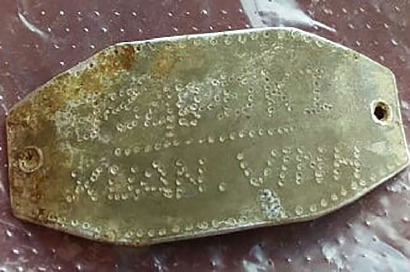 Phát hiện hài cốt liệt sĩ kèm theo tấm nhôm khắc ký hiệu: 934B. DKI. XUAN VINH 

