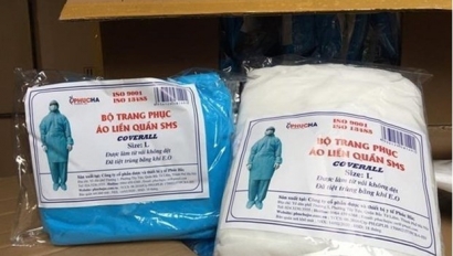 Truy tố 4 bị can trong đường dây buôn bán trang phục phòng dịch giả