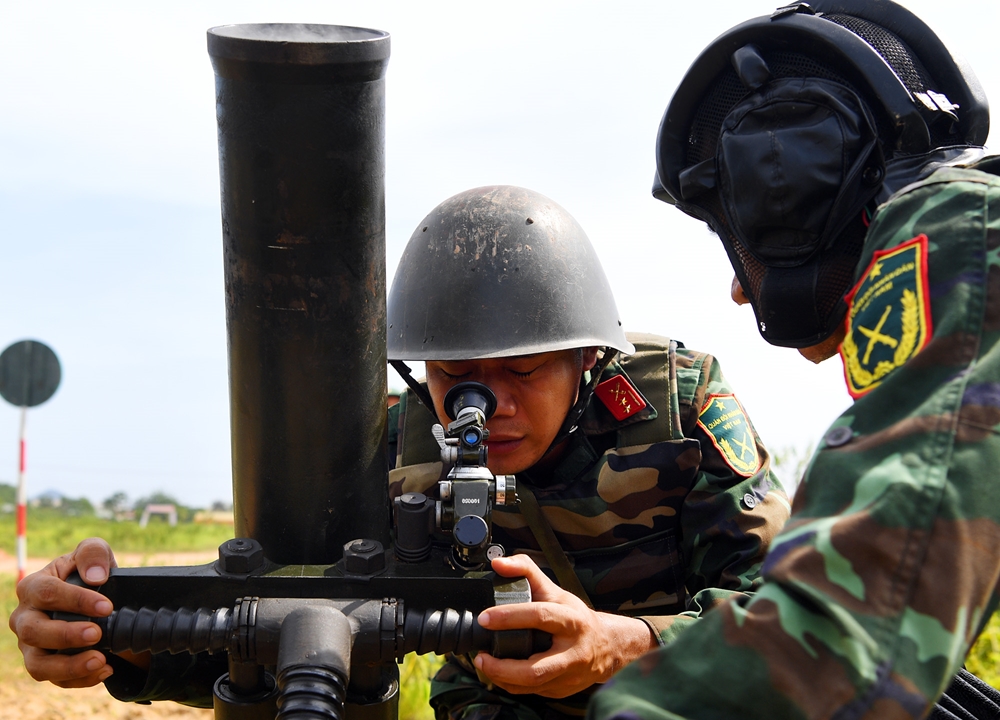 Hiệu chỉnh tầm ngắm của cối là giai đoạn cân não nhất với các vận động viên.