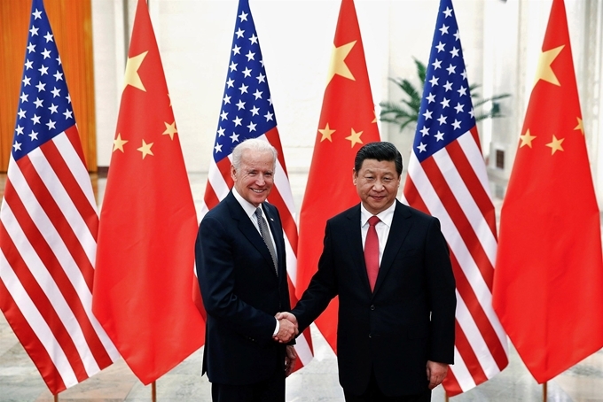 Chủ tịch Trung Quốc Tập Cận Bình và ông Joe Biden trong cuộc gặp tại Bắc Kinh ngày 4-12-2013. Ảnh: Reuters