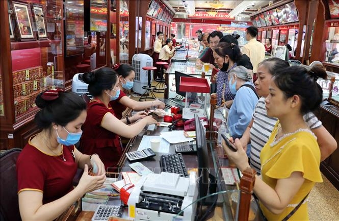 Vàng tiếp đà tăng trong phiên giao dịch chiều 13-12. Ảnh: TTXVN.