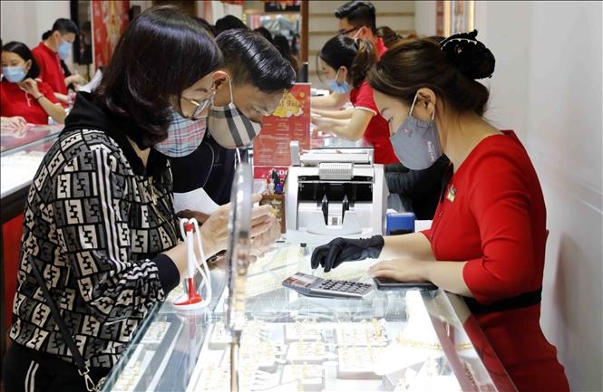 Giá vàng trong tăng nhẹ trong phiên giao dịch ngày 21-2. Ảnh minh họa: TTXVN