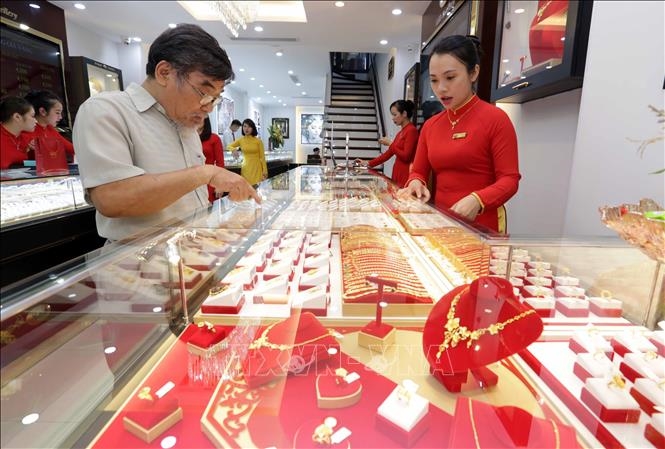 Giá vàng hôm nay tiếp tục giảm nhẹ. Ảnh minh họa: TTXVN.