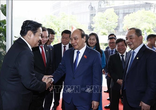 Chủ tịch nước Nguyễn Xuân Phúc dự Triển lãm Ảnh nghệ thuật quốc tế lần thứ 11 tại Việt Nam