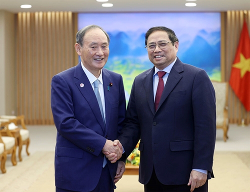 Thủ tướng Chính phủ Phạm Minh Chính tiếp nguyên Thủ tướng Nhật Bản Suga Yoshihide
