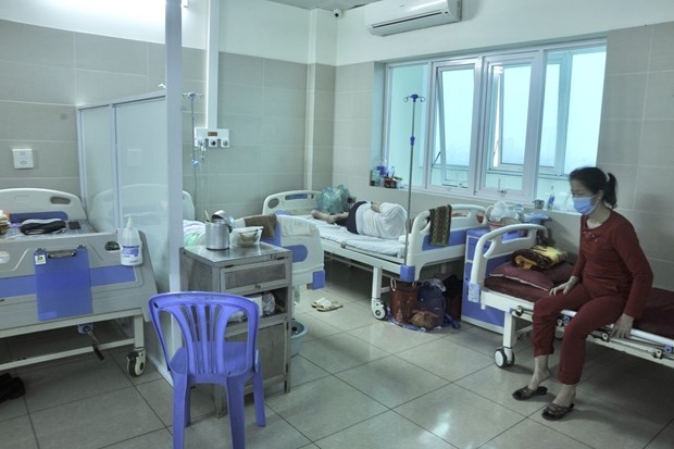  Bệnh nhân mắc Covid-19 đang điều trị tại Bệnh viện Thanh Nhàn, Hà Nội. Ảnh: PV/Vietnam+