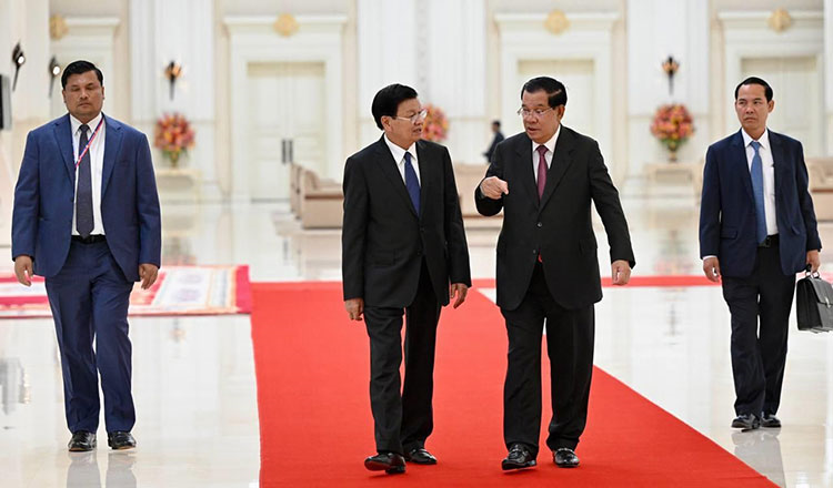 Tổng Bí thư, Chủ tịch nước Lào đánh giá cao sự chuẩn bị của Campuchia cho SEA Games 32