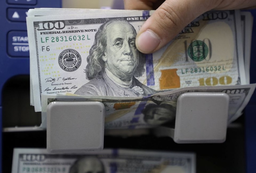 Tỷ giá USD hôm nay 8-5: Đồng USD tiếp tục mắc kẹt trong phạm vi hẹp. Ảnh minh họa: Reuters. 