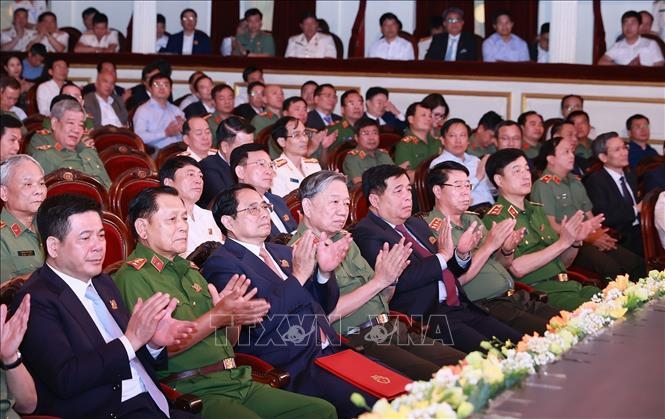 Thủ tướng Chính phủ Phạm Minh Chính và các đại biểu dự Lễ kỷ niệm 70 năm Ngày truyền thống lực lượng An ninh kinh tế.  