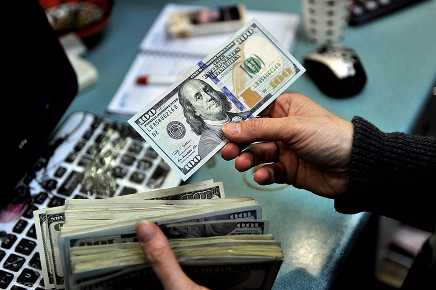 Tỷ giá USD hôm nay 21-5: Đồng USD tiếp đà tăng tuần. Ảnh minh họa: Reuters. 