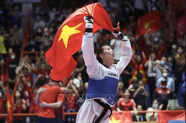 Võ sĩ Trương Thị Kim Tuyền của Việt Nam đã gây tiếng vang ở Giải vô địch Taekwondo thế giới 2023 sau khi đánh bại võ sĩ Daniela Paola Souza của Mexico. Ảnh: TTXVN 