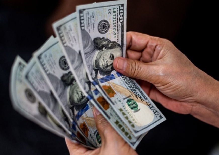 Tỷ giá USD hôm nay (14-6): Đồng USD trượt dốc sau dữ liệu lạm phát Mỹ. Ảnh minh họa: Reuters. 