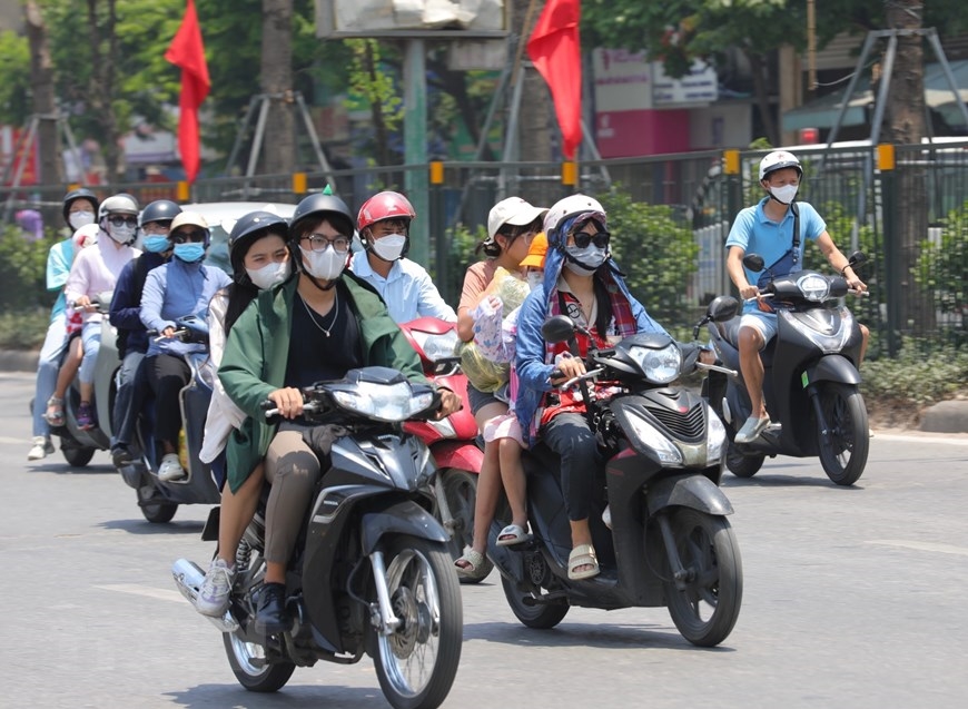 Hà Nội oi bức, nắng nóng, vượt 38 độ C. Ảnh minh họa: TTXVN 