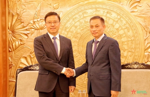 Đồng chí Lê Hoài Trung tiếp Trợ lý Trưởng ban Liên lạc đối ngoại Trung ương Đảng Cộng sản Trung Quốc