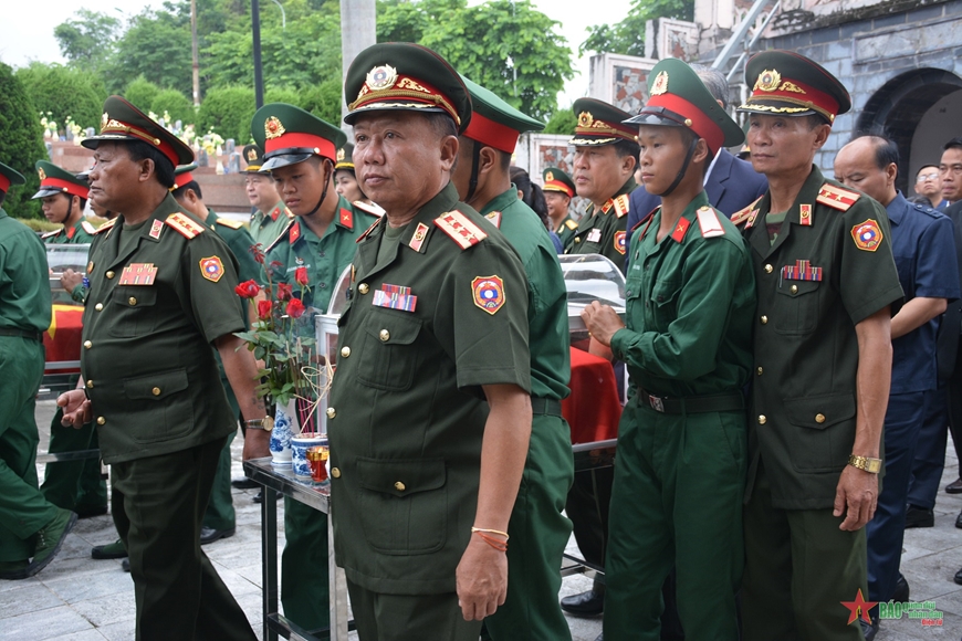 View - 	Điện Biên án táng 12 hài cốt liệt sĩ quân tình nguyện Việt Nam