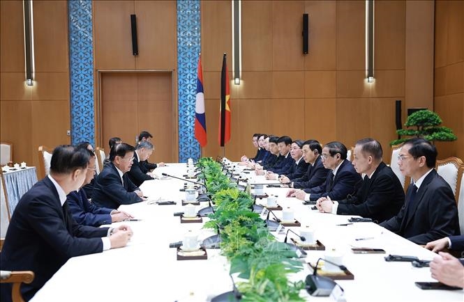 Thủ tướng Phạm Minh Chính gặp Tổng Bí thư, Chủ tịch nước Lào Thongloun Sisoulith