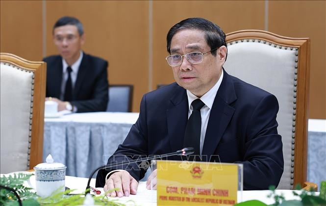 Thủ tướng Phạm Minh Chính gặp Tổng Bí thư, Chủ tịch nước Lào Thongloun Sisoulith