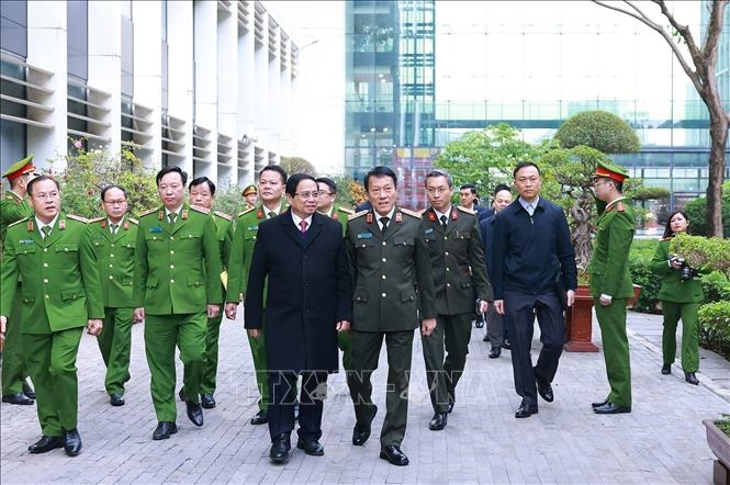Thủ tướng Phạm Minh Chính thăm, chúc Tết cán bộ, chiến sĩ Cục Cảnh sát quản lý hành chính về trật tự xã hội (Bộ Công an). Ảnh: Dương Giang-TTXVN 