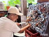 Bền bỉ theo đuổi nghệ thuật khảm sành