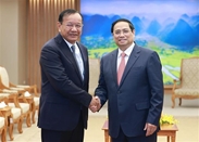 越南政府总理范明政会见柬埔寨副首相兼外交与国际合作部大臣布拉索昆