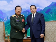政府总理范明政会见老挝副总理兼国防部部长占沙蒙·占雅拉