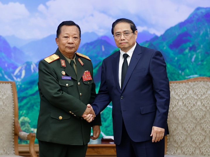 政府总理范明政会见老挝副总理兼国防部部长占沙蒙·占雅拉