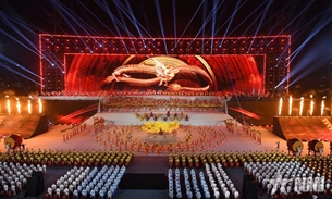 ລາຍ​ການ​ສະ​ແດງ​ສິ​ລະ​ປະ​ພິ​ເສດ ​ຊົມ​ເຊີຍ​ຜົນ​ສຳ​ເລັດ​ຂອງກອງ​ປະ​ຊຸມ​ໃຫຍ່ ​ຄັ້ງ​ທີ XIV ຂອງ​ພັກ​ກອມ​ມູ​ນິດຫວຽດ​ນາມ