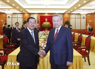 លោក To Lam អគ្គលេខាបក្ស ជួបជាមួយប្រធានគណបក្សប្រជាជនកម្ពុជា