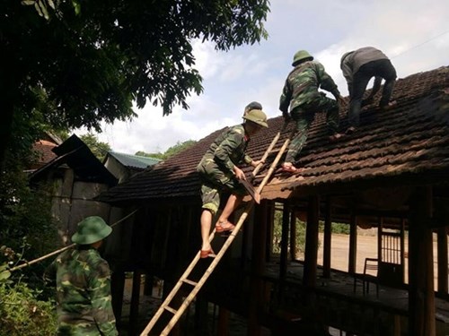 Troops help local people overcome disaster consequences