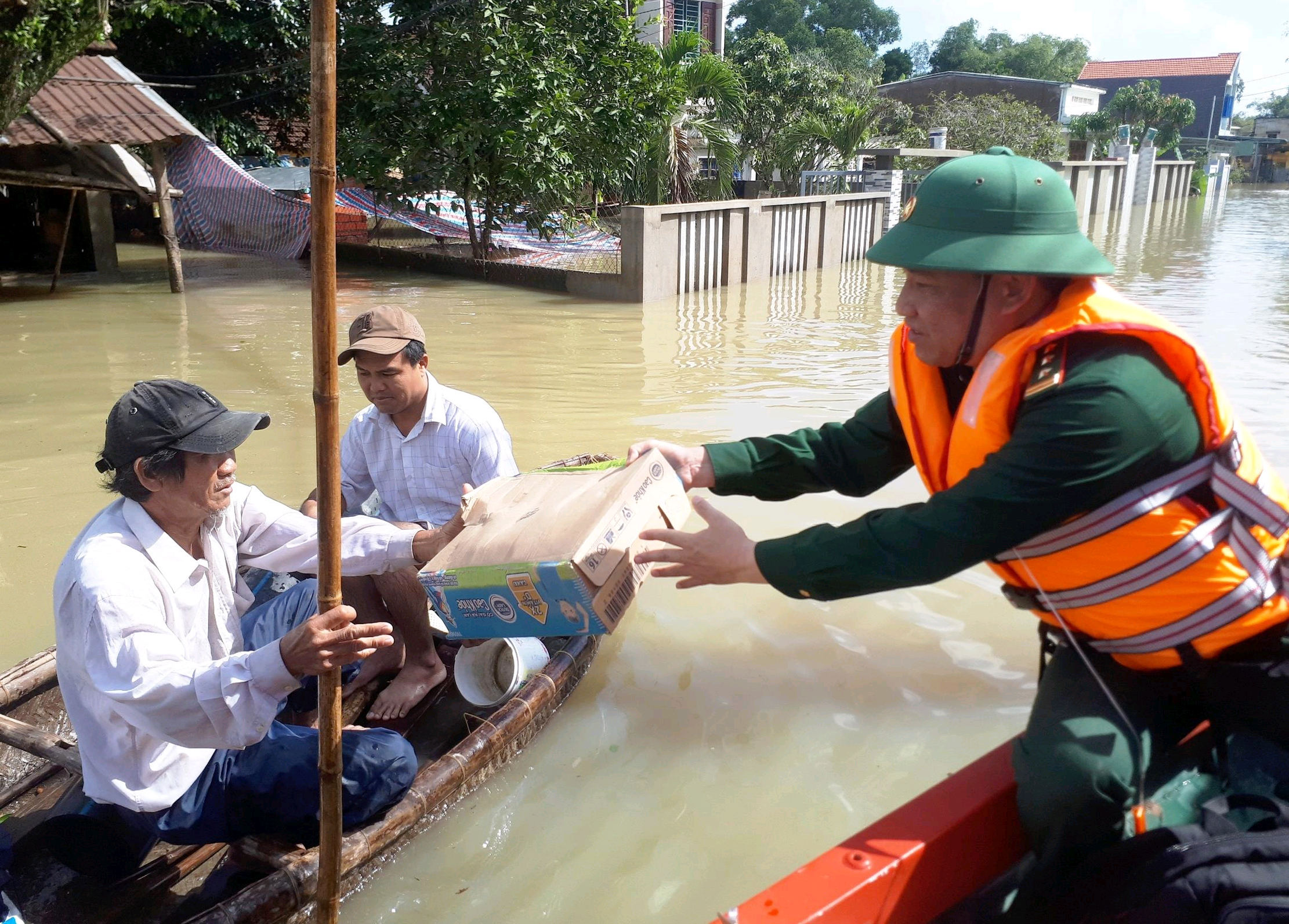 Troops help locals overcome flood consequences