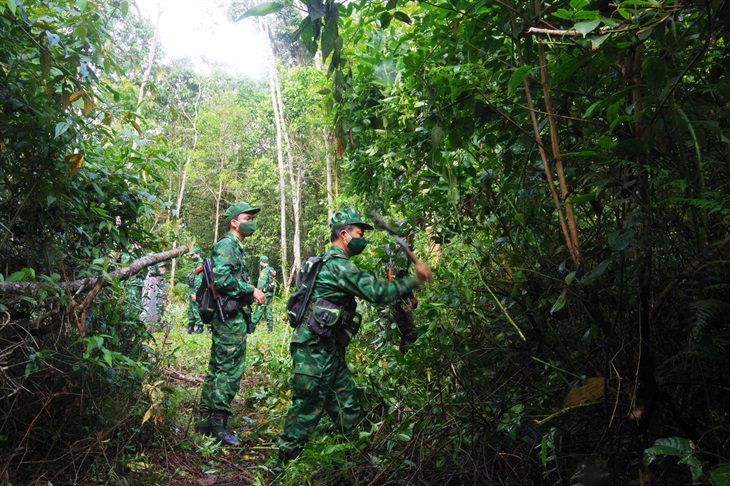 Vietnamese And Lao Units Conduct Joint Patrol