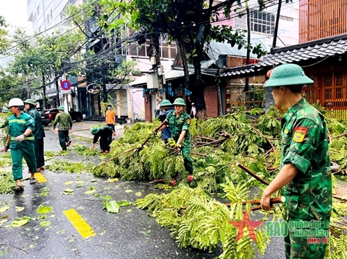 Troops and militiamen help people surmount storm aftermaths