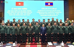 Vietnamese Military Collectives and Individuals Receive Noble Lao Rewards