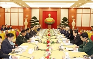 Top leaders of Vietnamese, Lao parties meet in Hanoi