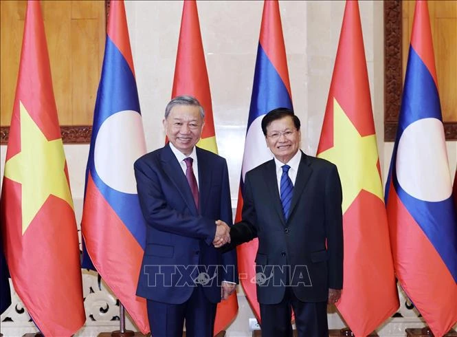 Vietnam, Laos agree to further bolster all-round cooperation