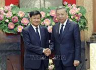 President receives Lao Party General Secretary