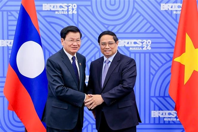 Prime Minister Pham Minh Chinh meets Lao top leader