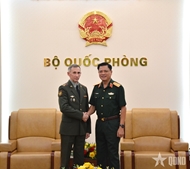 Defense leader receives Russian defense attaché