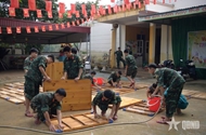 Troops urgently help localities overcome flood aftermath