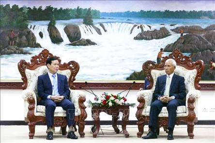 Party commissions of Vietnam, Laos strengthen cooperation in communications