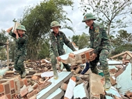 Over 8,200 military troops respond to flood aftermath in Central provinces