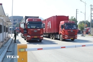 Vietnam, China pilot two-way cargo transport at int’l border gate pair