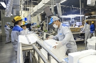 Vietnam’s economy maintains momentum despite dual shocks in first 11 months