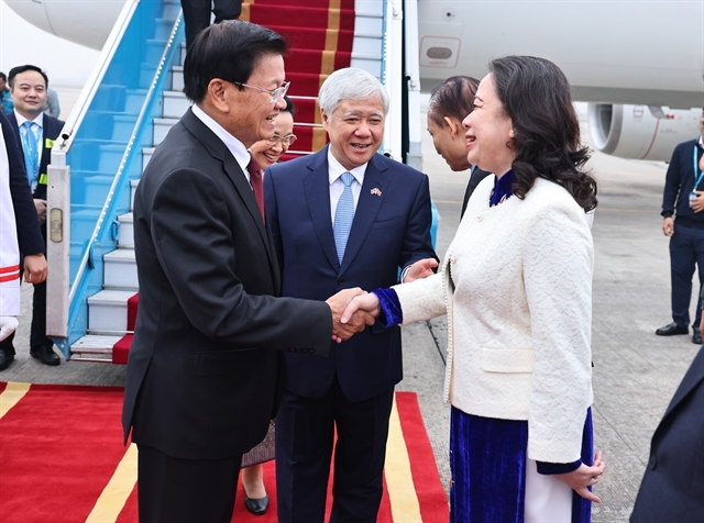 Top Lao leader arrives in Hanoi, beginning state visit to Vietnam